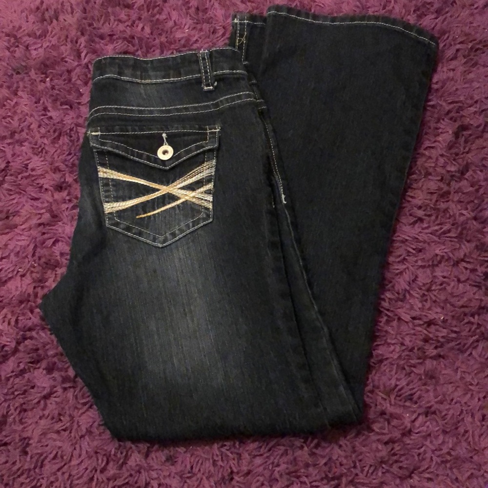 Rue21 mid rise boot cut ladys size 7/8 dark jeans